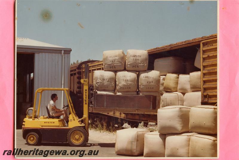 P08880
Wool bales being loaded/unloaded by a forklift into/from a WVX class standard gauge van,(later reclassified to WBAX class),
