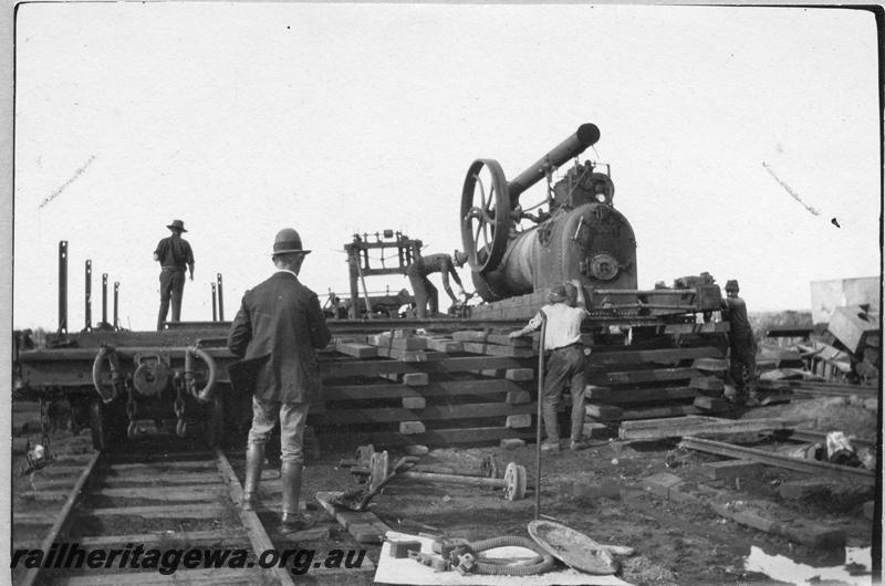 P08900
16 of 29 views of the construction of the Wyalkatchem-Lake Brown-Southern Cross railway, WLB line. Workers preparing to move the adzing machine
