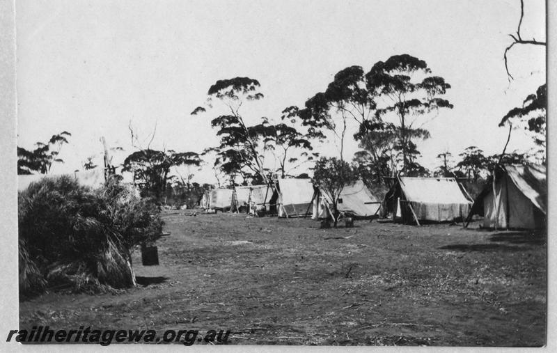 P08902
18 of 29 views of the construction of the Wyalkatchem-Lake Brown-Southern Cross railway, WLB line, workers campsite, row of tents.
