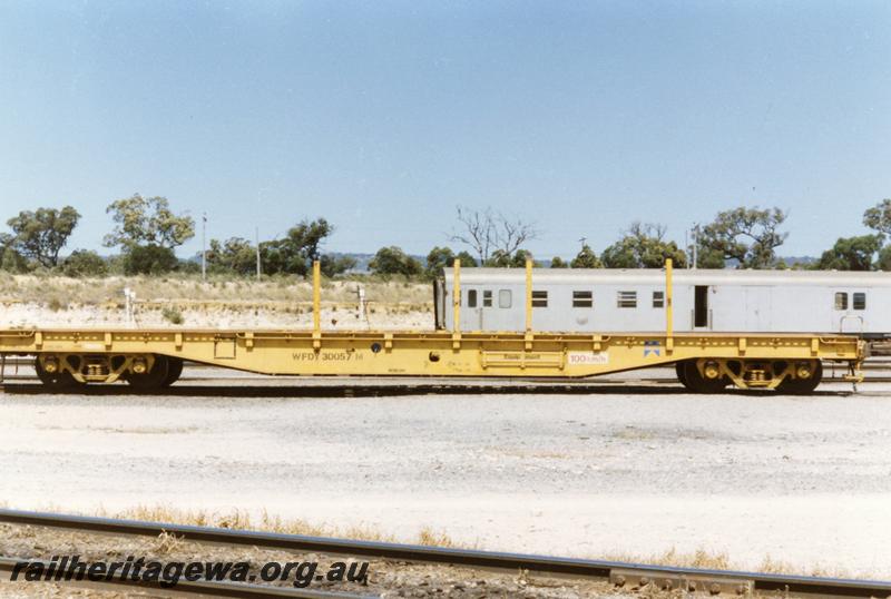 P08951
WFDY class 30057-M standard gauge flat wagon, side view. Originally a WF class, built at the Midland Workshops.
