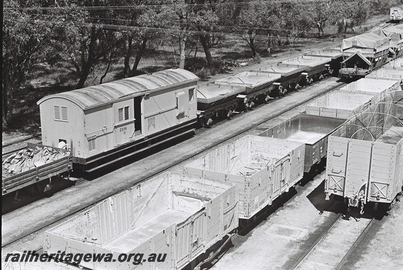 P09080
Z class 516 and other wagons in yard at Narrogin, GSR line, elevated view of sidings on the eastern side of the yard, GMD class open wagon in the consist.
