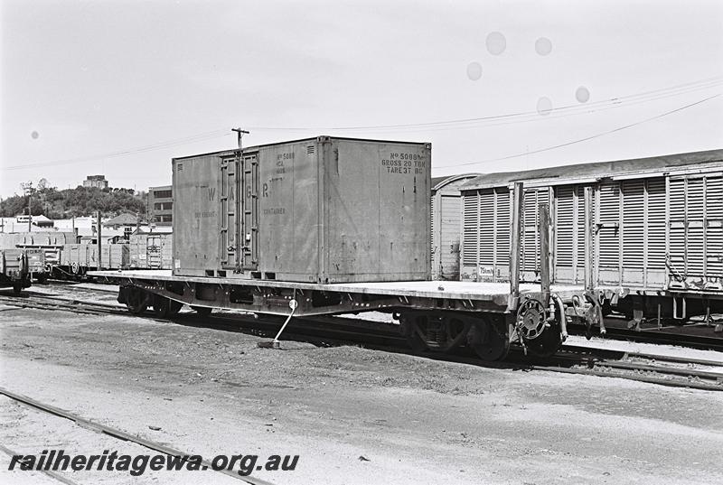 P09082
QUA class bogie flat wagon loaded with a WAGR 