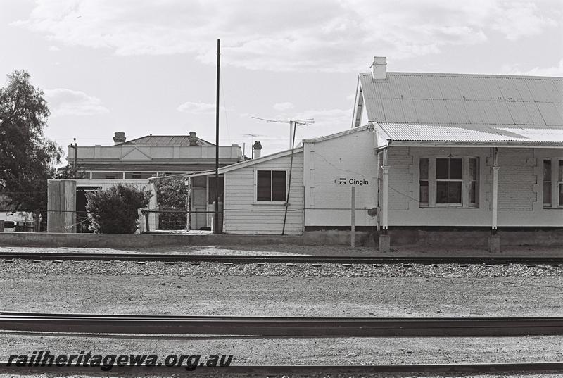 P09165
5 of 10 views of the station building at Gingin, MR line, track side view of the left hand end of the building and the small shed at the end of the building
