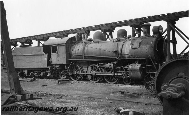 P09460
L class 240 4-6-2 at Kalgoorlie loco depot, renumbered 475 in 1949, elevated road in background is access to coal stage. Goggs No. 65. same as P3043
