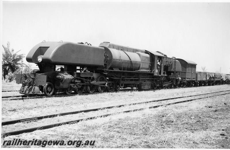 P09461
ASG class 26 4-8-2+2-8-4 Garratt loco at Bellevue on train, sold to SAR 7/11/1951, renumbered SAR 305. Goggs No. 351.
