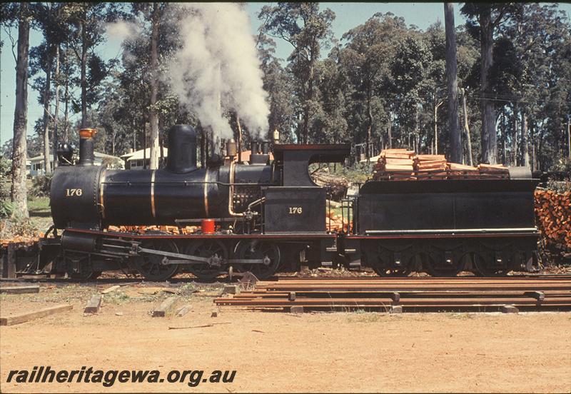 P09916
YX 176, Donnelly River Mill, timber fuel stacks for loco.
