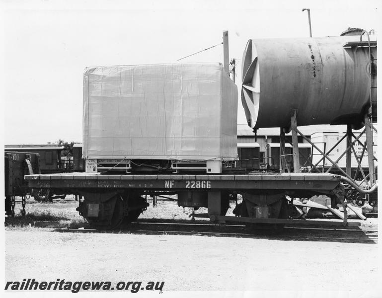 P10194
NF class flat wagon with covered load, side view, at the 1963 