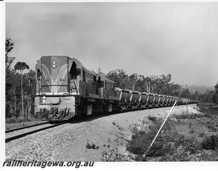 P10683
D class 1565 narrow gauge diesel locomotive and a sibling unit at the head of a loaded bauxite train between Jarrahdale and Mundijong.
