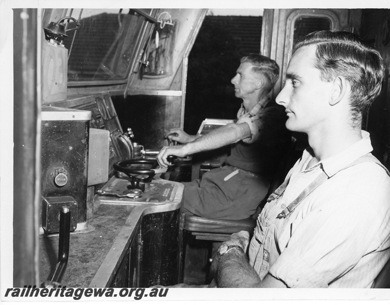P10687
Locomotive Crew pictured in the cab of an X class narrow gauge diesel locomotive.
