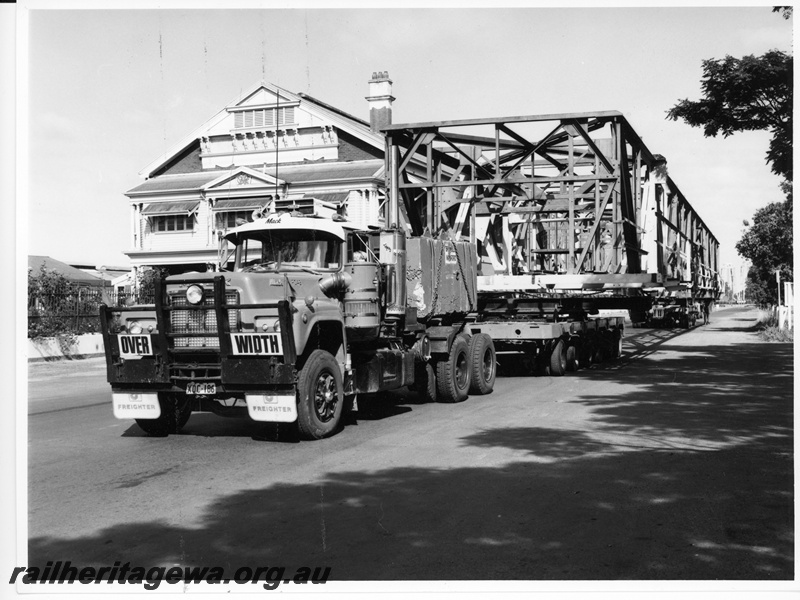P10714
An oversized fabricated load travelling east along Montreal Road Midland, past the Chief Mechanical Engineers Office after leaving the Workshops at the western end.
