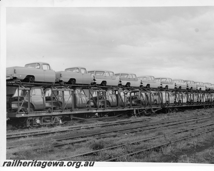 P10715
QMB class 20005 car carrier wagon, and a sibling wagon, loaded with utility, station wagon, panel vans and truck cabs for General Motors Holden at Cottesloe
