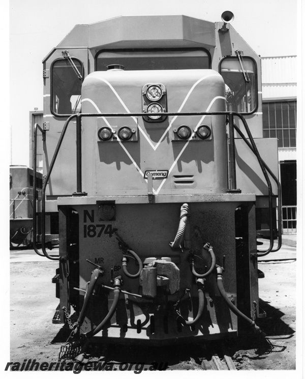 P10736
N class 1874 narrow gauge diesel locomotive pictured outside the Forrestfield Loco depot. Good front view of engine.
