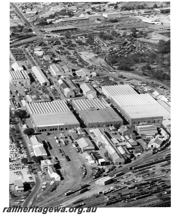 P10758
An overhead of the three main buildings at Midland Workshops. The building on the left is Block 1 Car & Wagon repairs, centre is Block 2, Blacksmiths and Boilermakers while the end is Block 3, the diesel and steam repair shop.
