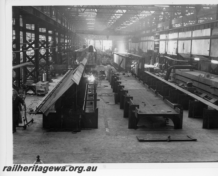 P10773
The Irwin River steel girder bridge under construction at the Midland Workshops showing jigs and frames.
