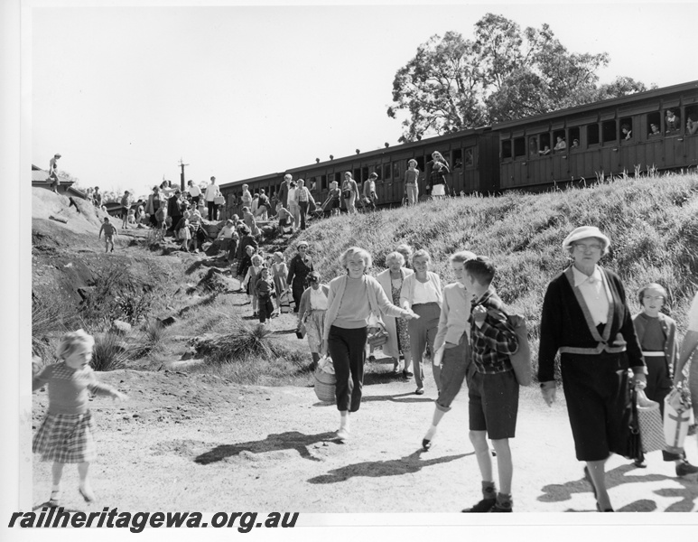 P10802
Picnickers leaving train comprising dog box carriages, National Park, ER line, below track level view
