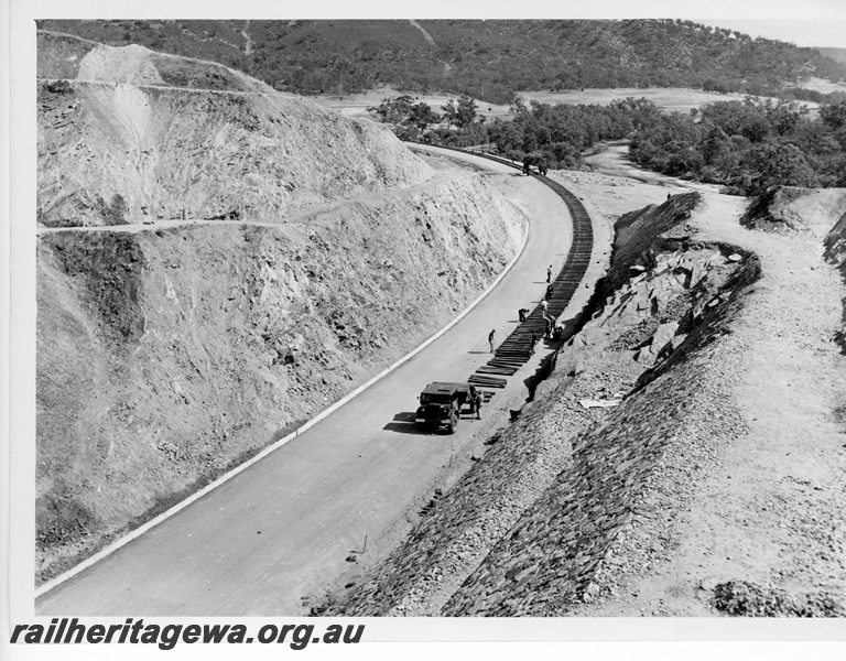 P10803
Standard gauge construction, workers laying sleepers, Windmill Cutting, Avon Valley line, view from elevated position, c1964
