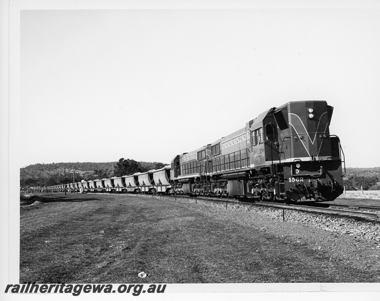 P10817
D class 1562 and another D class diesel, double heading  a loaded  bauxite train, Jarrahdale line,  side and front view
