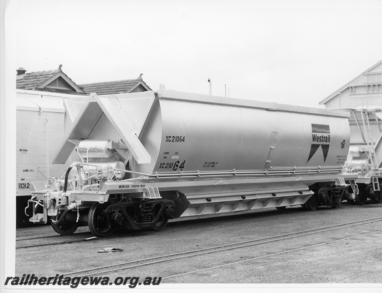 P10844
XC class 21064 bauxite hopper with Westrail tooth logo, end and side view
