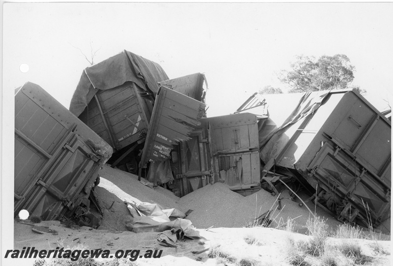 P10866
2 of 4 views of a derailed narrow gauge wheat train, No 506  Goods, near Carani, CM line, GH class wagons off the tracks, date of derailment 11/7/1969
