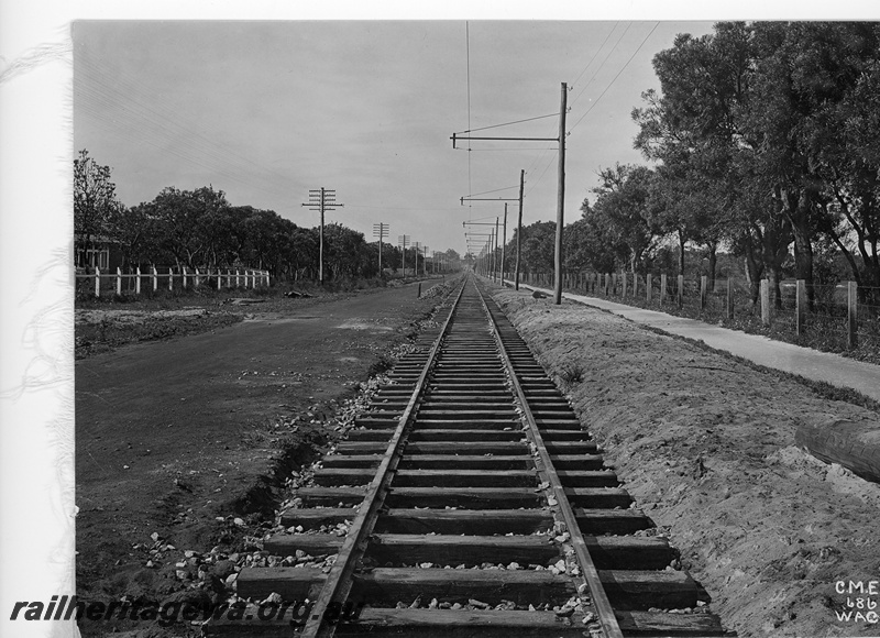 P10874
A single length of laid tram line not long after completion. Possibly in the South Perth area.
