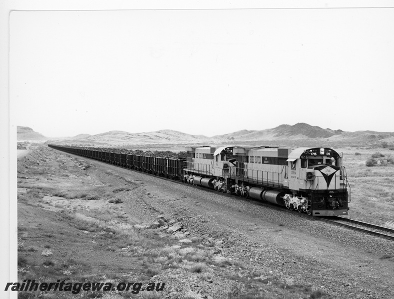 P10906
Cliffs Robe River (CRRIA) M636 class 1715, 1716 arrive Cape Lambert with a loaded iron ore train.
