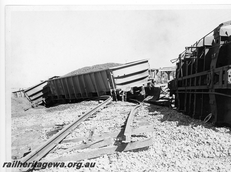 P10944
2 of 2 depicting the aftermath of the derailment of an iron ore train near Southern Cross. 16.3.1973, See P10919 and P10943.
