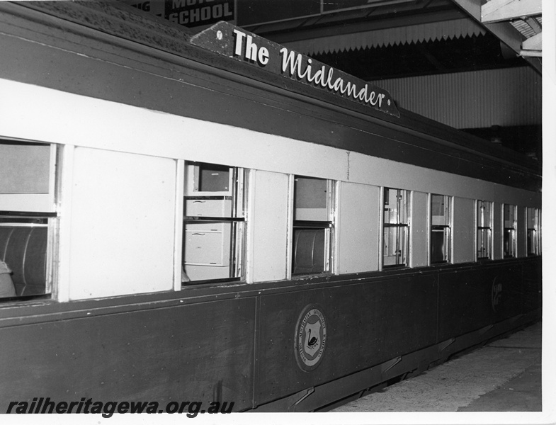 P10946
An unidentified ARM class second class sleeping car with 'The Midlander' nameboard at No 7 Platform at Perth Station.
