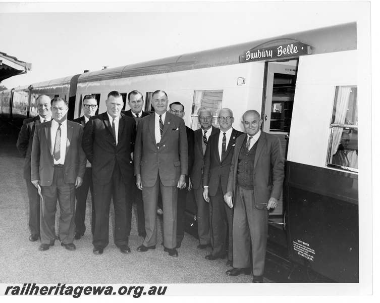 P10947
Mr. C. G. C. Wayne, Commissioner of Railways; centre of photo; with a group of Senior Managers standing by the side of an unidentified AYU class saloon trailer as part of the new 'Bunbury Belle' service that was introduced between Perth and Bunbury.
