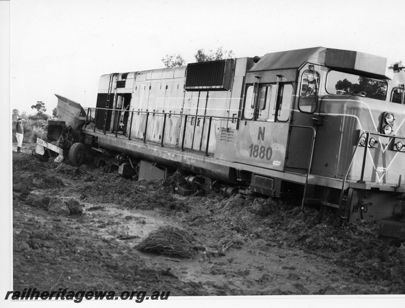 P10948
1 of 7. N class 1880 diesel locomotive derailed after colliding with a sand truck at Wagerup, SWR line. Date of derailment 11/9/1981
