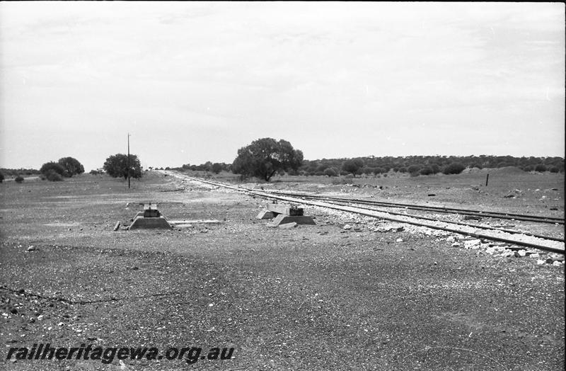 P11154
Yard, foundations of tank stand, Tuckanarra, NR line, view looking north. 

