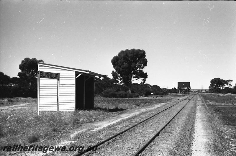 P11196
Passenger shelter shed, water tower, Burngup, WLG line, view along the track
