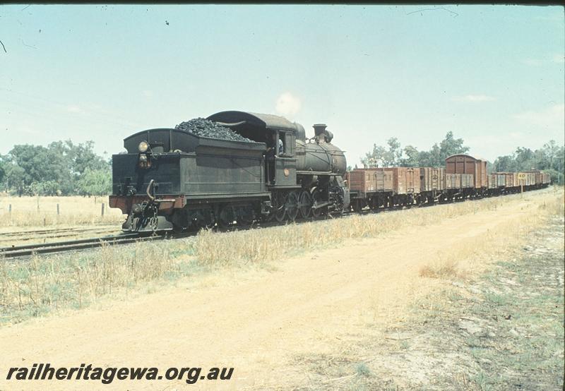 P11244
FS class 411, tender first on goods train, arriving Picton Junction? SWR line, ex MRWA wagon in the consist, headlight on the rear of the tender, speed sign, 40 mph, black numerals on a yellow board.
