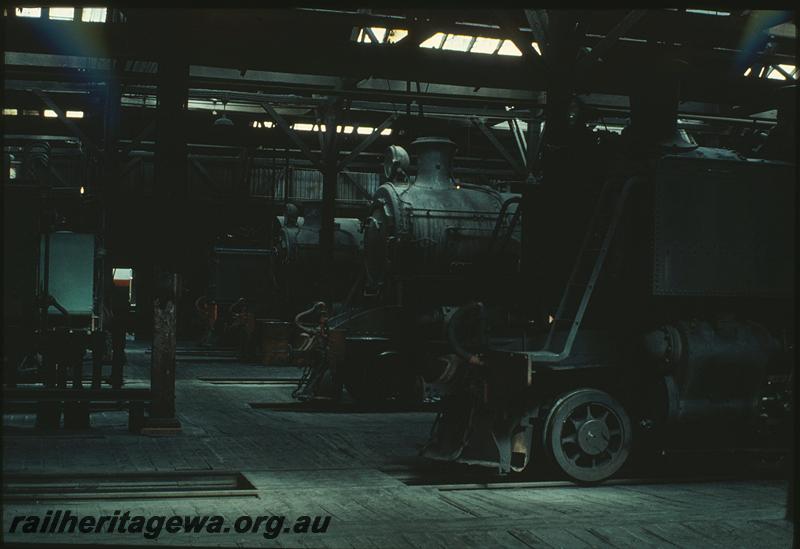 P11258
Interior of shed, parts of FS class, W class, PMR class, DD class visible, East Perth loco shed. ER line.
