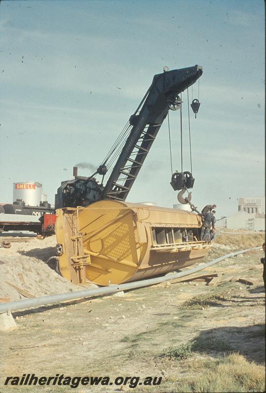 P11450
60 ton Cowans Sheldon breakdown crane No. 31,  re-railing standard gauge wheat wagons, wheat silo road Leighton yard. ER line.
