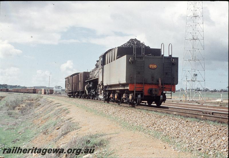 P11491
PM class 710, short goods train, base of lighting tower, Avon Yard. Avon Valley line, loco running tender first.
