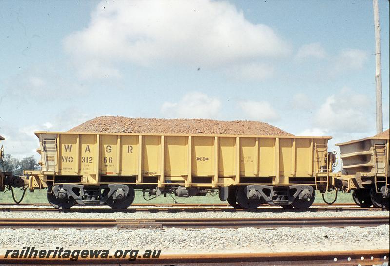 P11728
WO class 31256 iron ore wagon, side view, first iron ore train, Kwinana yard. FM line.
