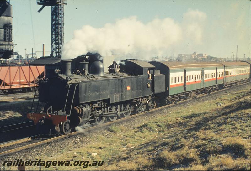 P11895
DD class 591, down suburban passenger, East Perth loco shed. ER line.
