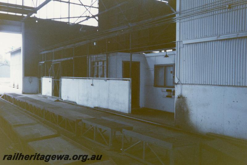 P12098
3 of 5 views of the loco shed at the Narrogin loco depot, GSR line, internal view showing the inspection pit.
