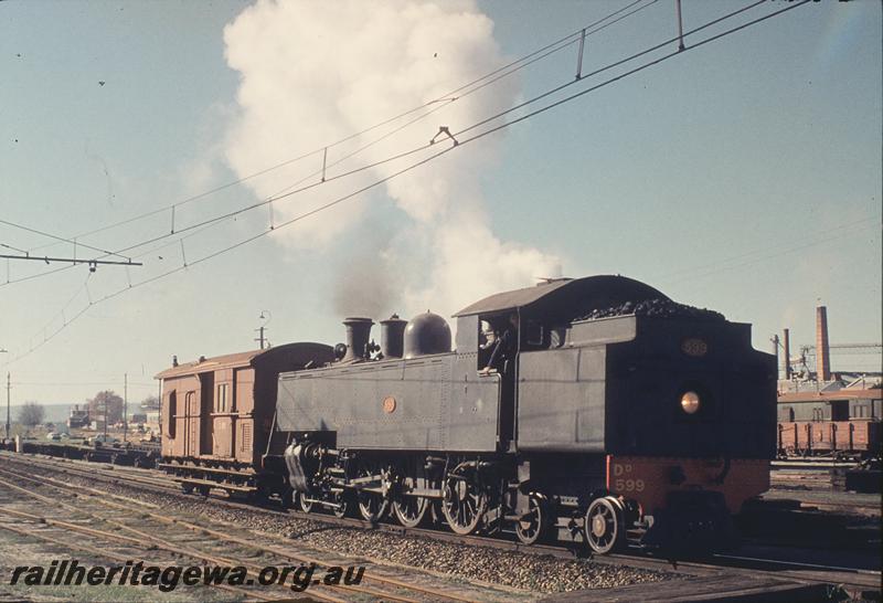 P12168
DD class 599, E&V, overhead wiring, arriving East Perth from SW main. SWR line.
