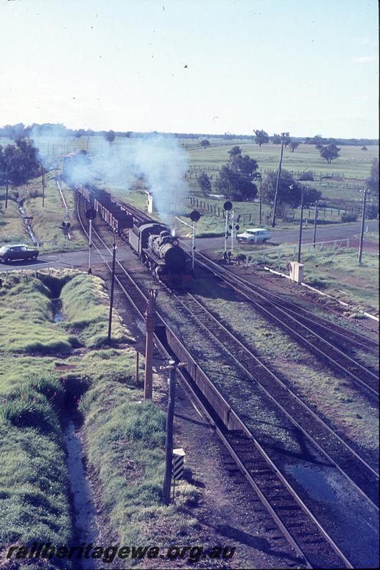 P12273
PM class 718, 37 goods, arriving Pinjarra, from water tower. SWR line.
