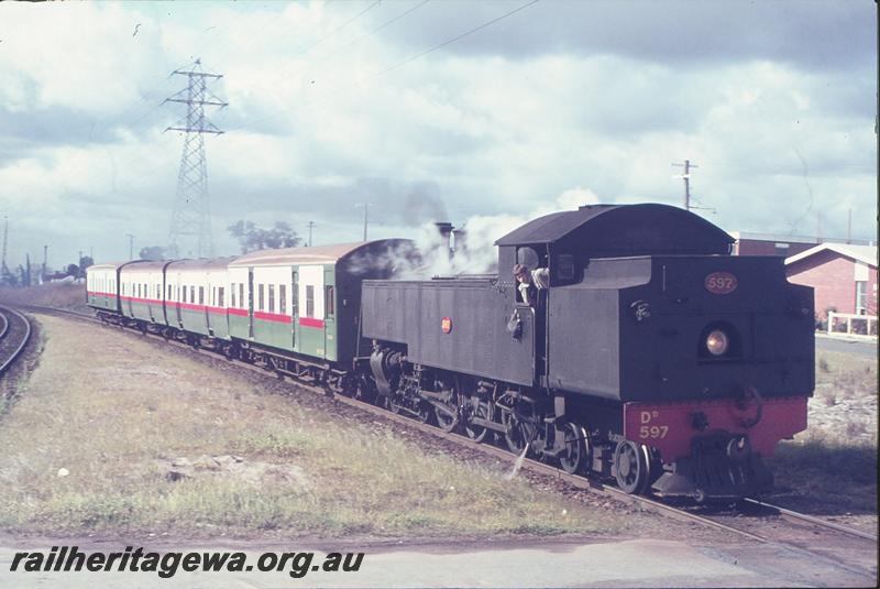 P12311
DD class 597 on last steam passenger ex Armadale, arriving Victoria Park. SWR line.
