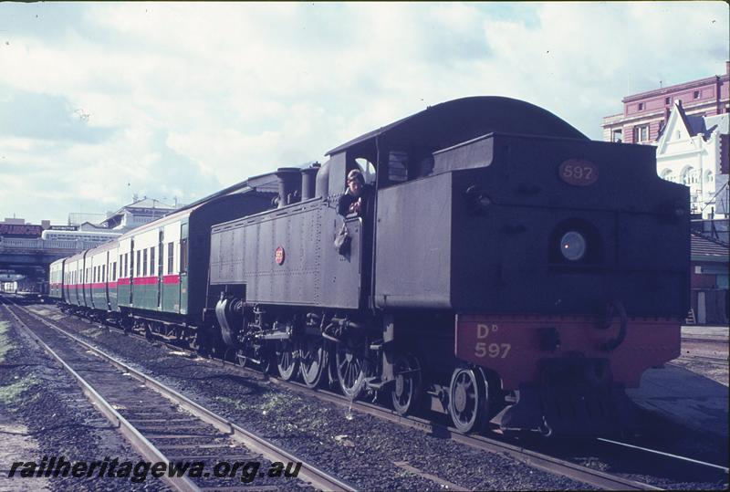 P12312
DD class 597 on last steam passenger ex Armadale, pulling empty coaches to carriage sheds, Perth. ER line.
