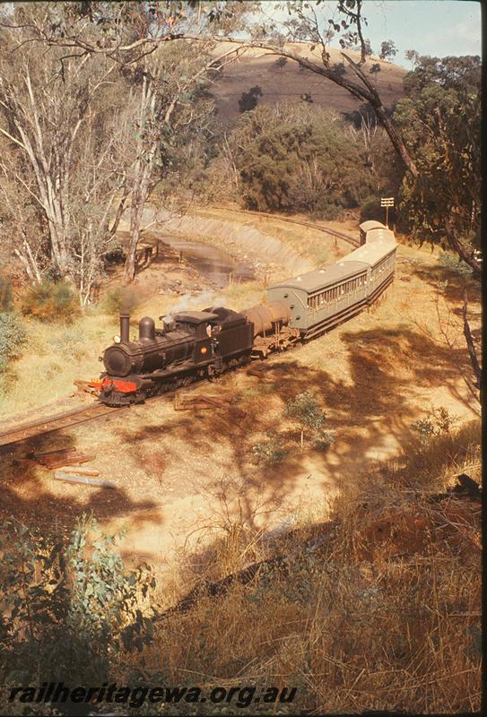 P12353
G class 233, with water gin, vintage train for USS Bainbridge, curve near Olive Hill. BN line.
