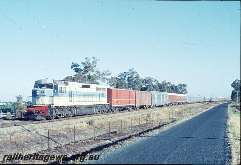 P12453
L class, Trans Australian, mixed Commonwealth Railways (CR) and ROA carriages, near Millendon Junction?, SG line.
