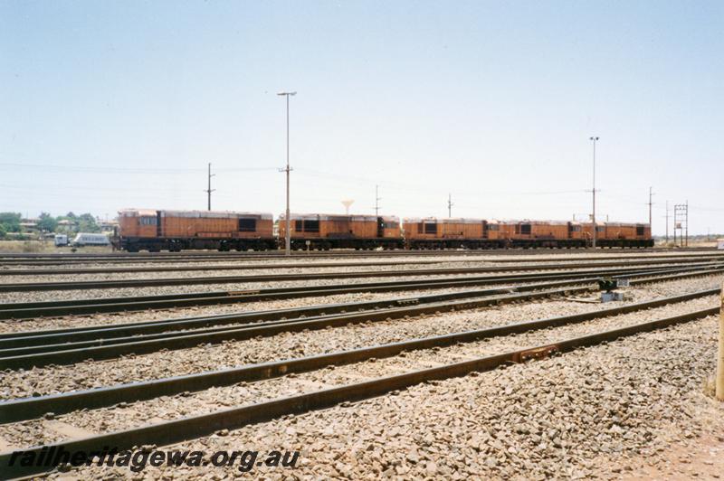 P12531
Port Hedland Nelson Point yard, line up of 5 former Goldsworthy A class English Electric locomotives awaiting transporting by road south
