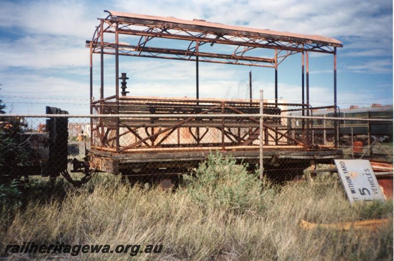 P12565
Four wheel open carriage, ex Point Samson, Pilbara Railway Historical Society museum, Dampier, side view
