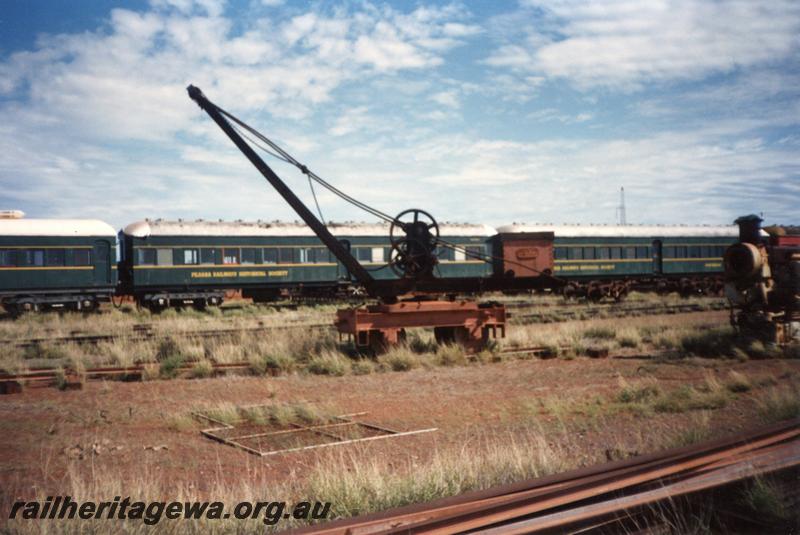 P12573
Rail mounted hand crane, Pilbara Railway Historical Society museum, Dampier, side view

