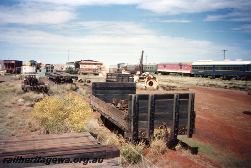 P12574
Jetty wagon, two plank sides and high bulkheads, Pilbara Railway Historical Society museum, Dampier, end and side view
