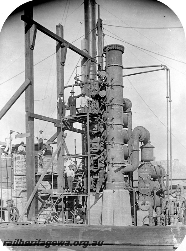 P12935
Condensing plant at Geraldton to supply water for the railways, a substantial structure with an 80foot high smokestack and water storage of 80,000 gallons above ground and 50,000 gallons below ground
