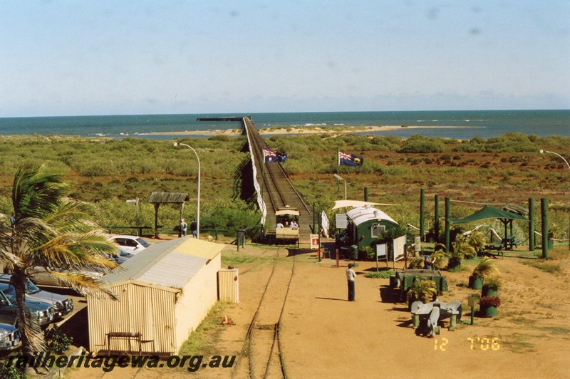 P13322
Carnarvon Jetty railway, elevated view looking towards the ocean.

